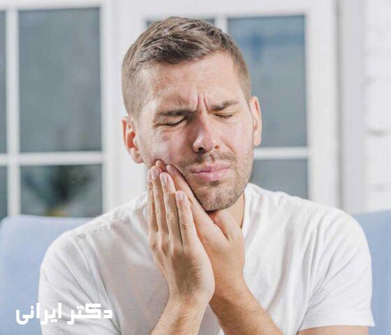 درد شدید دندان همراه با فشار و تورم لثه